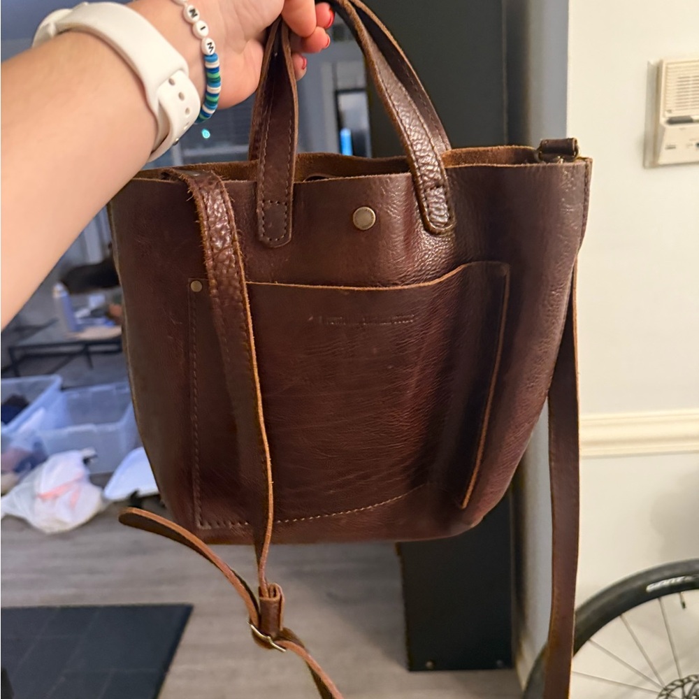 Elegant Brown Leather Tote with Versatile Design